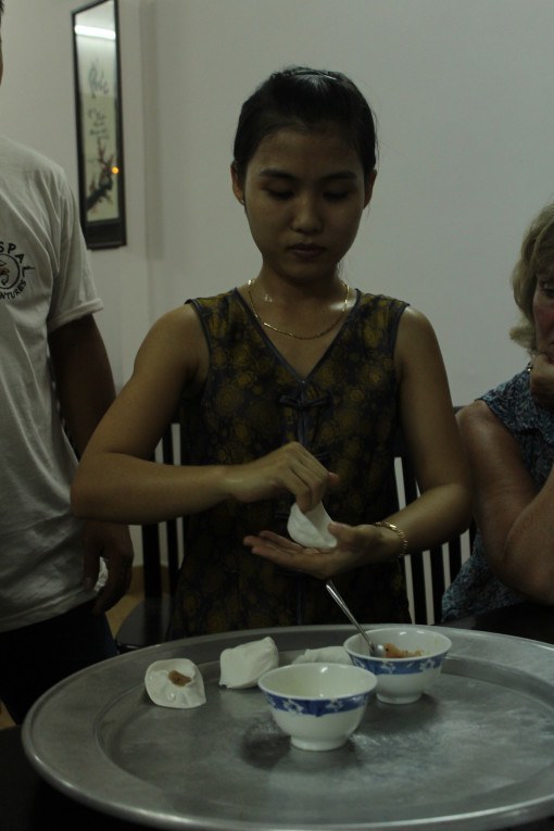 Watching a demonstration of "white rose" dumplings at bar #2