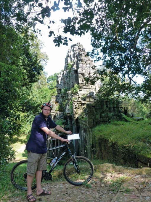 Tom cycling around the temples of Angkor