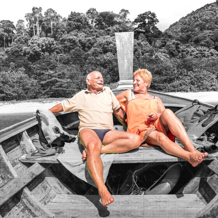 couple relaxing on boat couple relaxing on boat